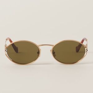 Miu Miu metal frame oval sunglasses